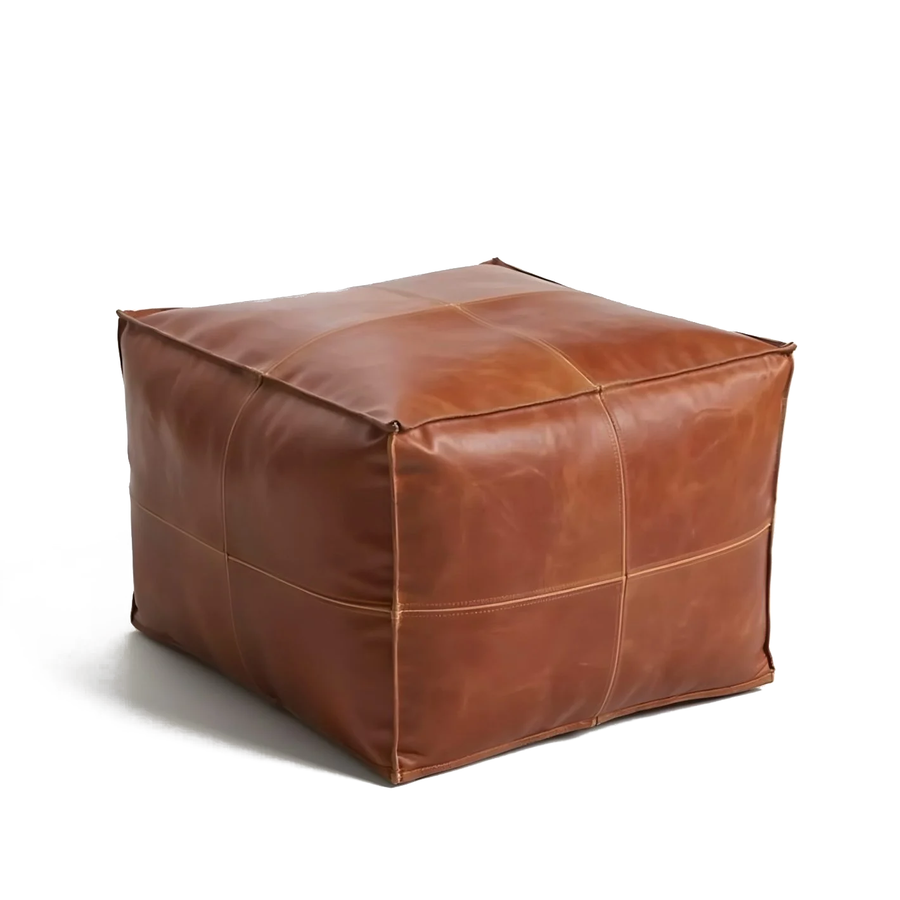 Moroccan square natural leather pouf in light brown full-grain goatskin, on a white background