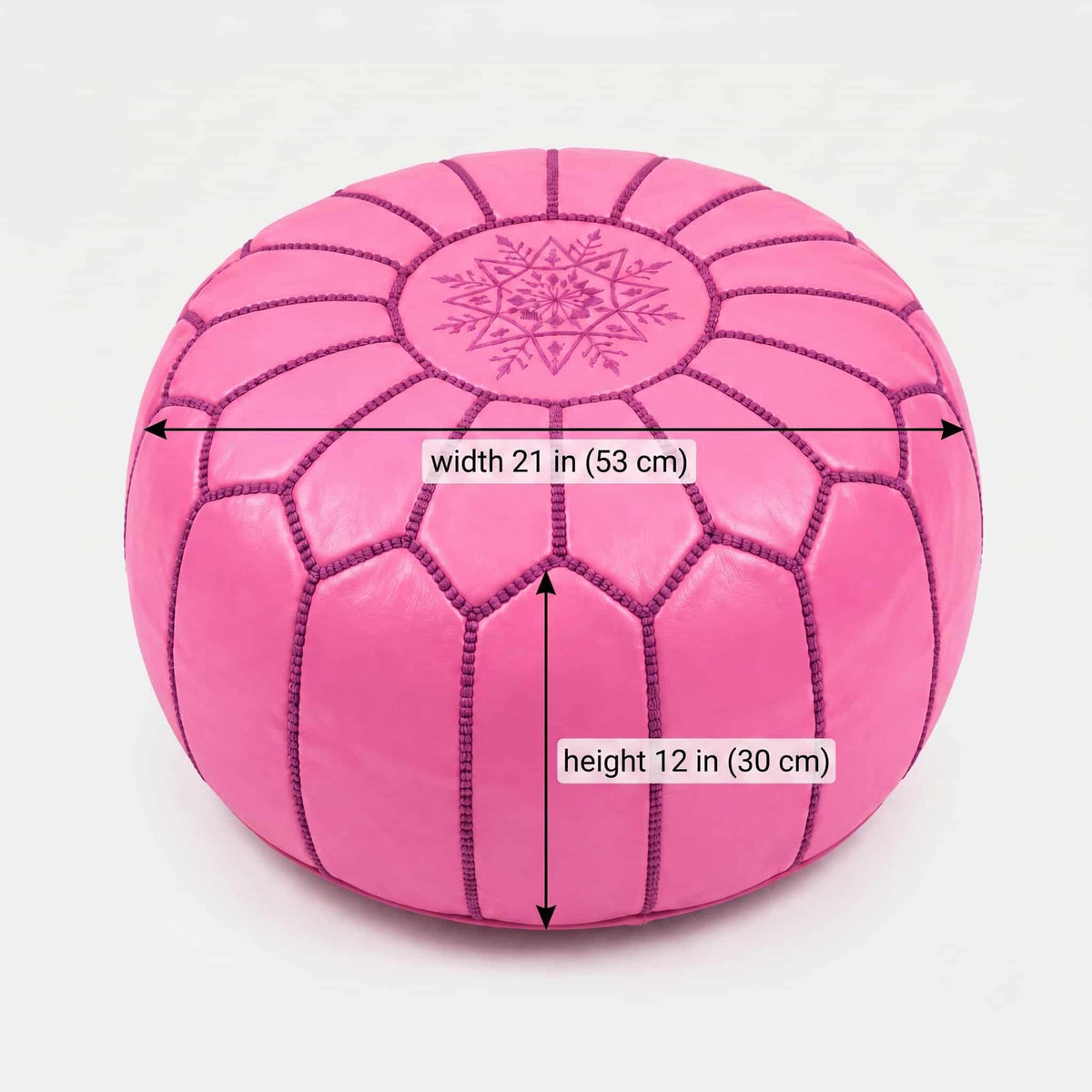 Dimension diagram of the pink leather round pouf: 21 in wide by 12 in tall (53 by 30 cm)