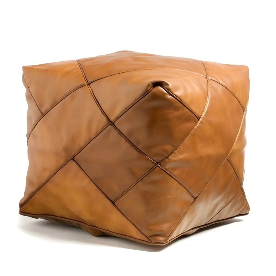 Square Moroccan leather floor pouf in light brown with hand-stitched diamond panels, on a plain white background