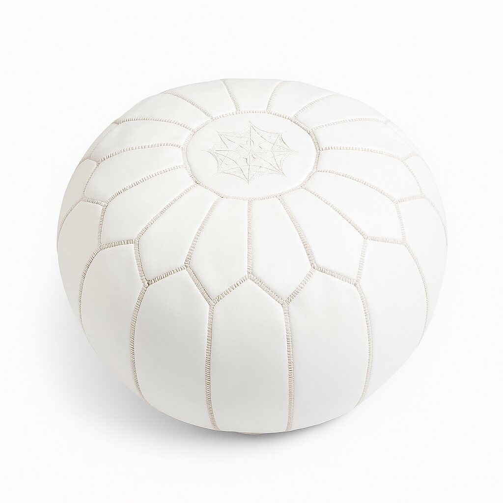 White Moroccan leather round pouf with hand-embroidered eight-pointed star on a plain background