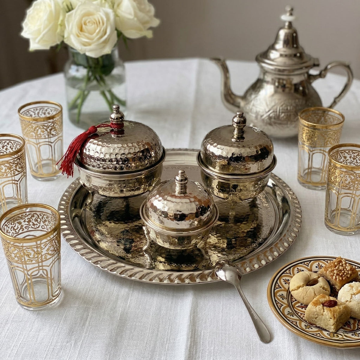 Hand-hammered silver-plated tea container service, 4-piece with ornate tray — image 2