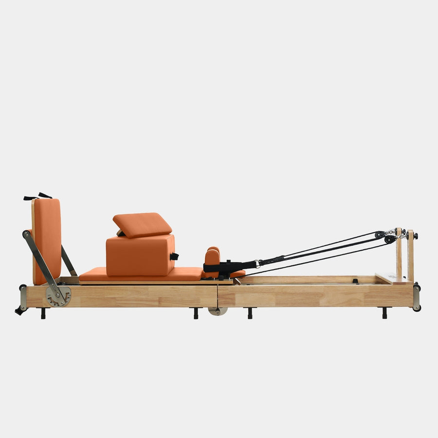 Foldable Solid-Wood Pilates Reformer, a Pilates reformer for home or studio use